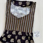 AA0241 Peacock Pleats zip